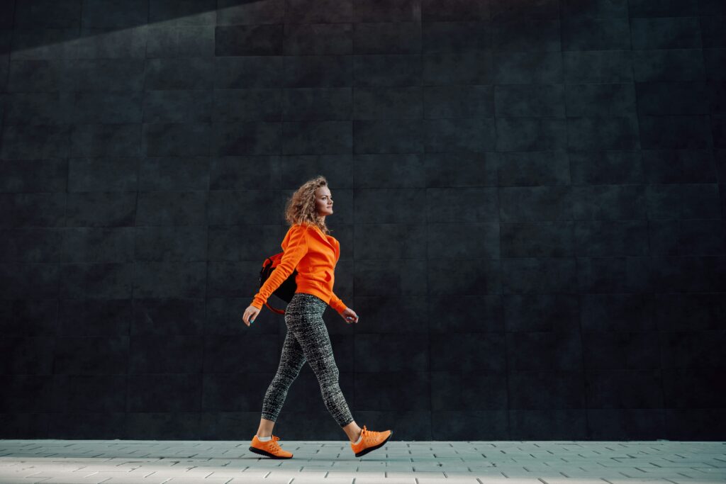 woman walking after lunch to support steady blood sugar