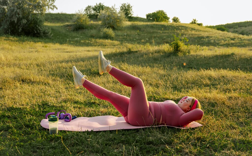 woman stretching outdoors to reduce stress