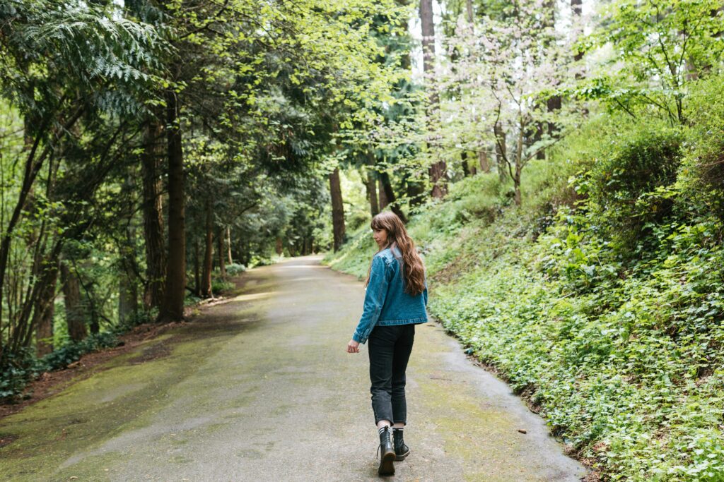 woman walking to help regulate cortisol naturally